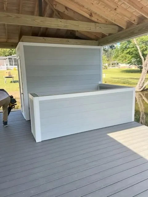 Sundecks and storage rooms: Twin Lakes work on Lake Gaston