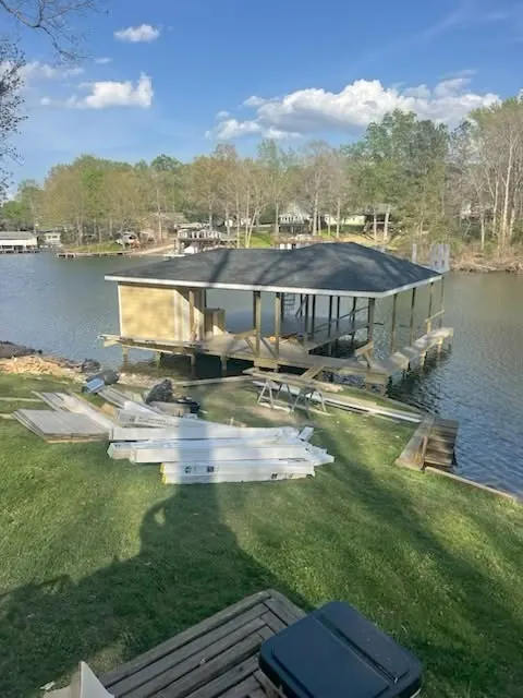 Hip-roof boathouse in Fox Hollow, stage photo